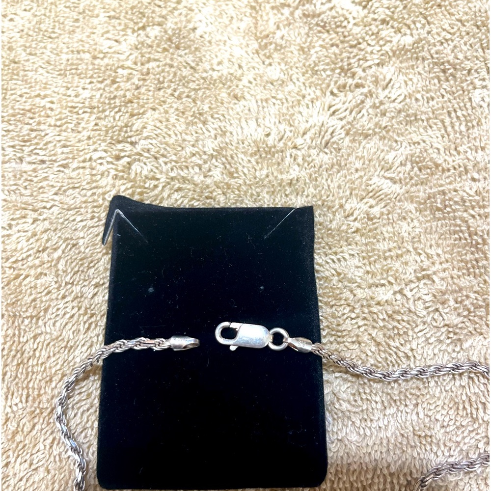 Sterling Silver chain.